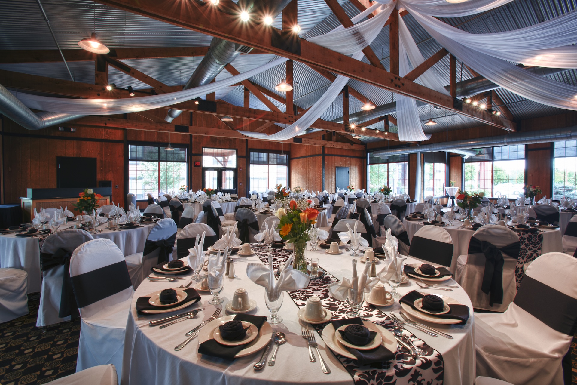 The Pavilion set up with tables for a fancy wedding